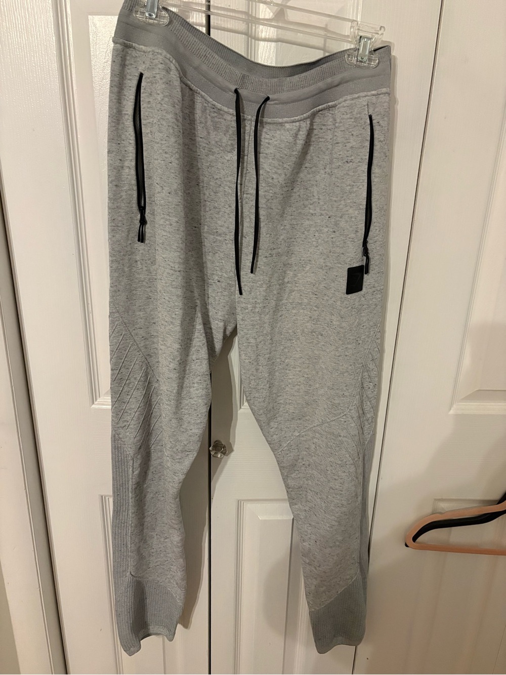 Gymshark Light Grey Tapered Joggers with Zip Pockets